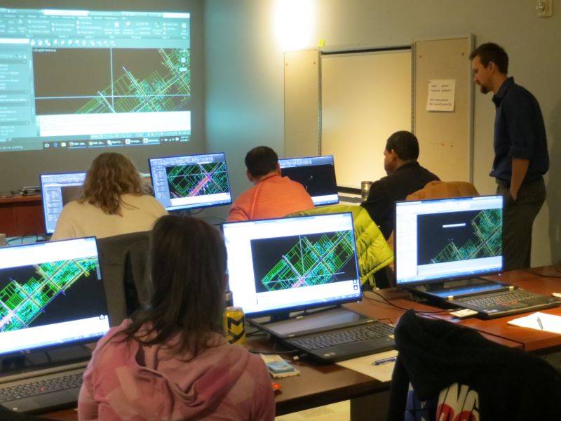 Group of students at computers in a CADD Training Room